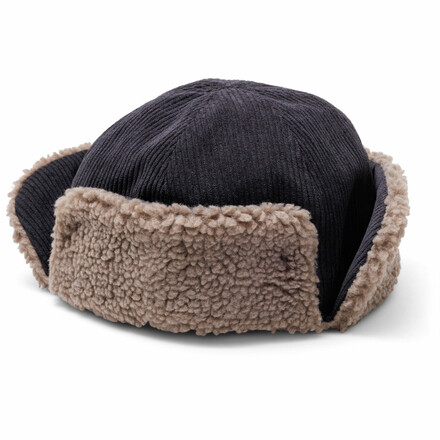 Die Kavu Fur Ball Fudd ist eine warme Trapper-Mütze mit Sherpa-Fleece-Futter und Ohrklappen – ideal für kalte Wintertage.